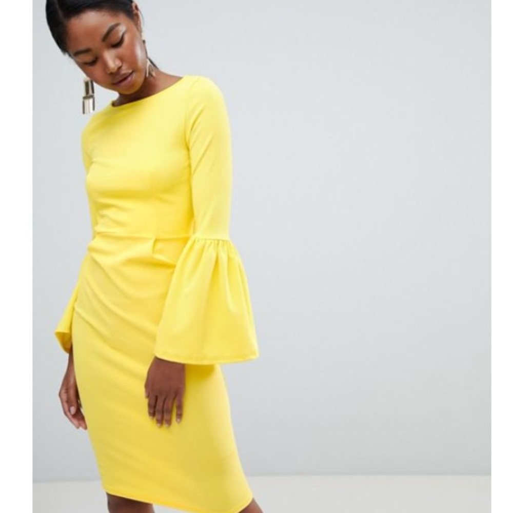 A yellow fit dress with flared sleeves